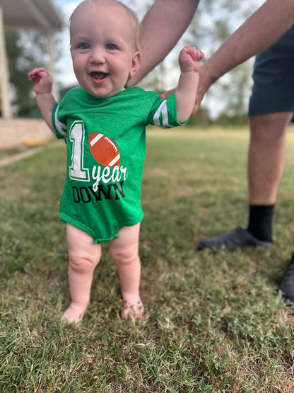 Baby's First Birthday Apparel, Green and Brown Football Design, Toddler Sports Theme Bodysuit, Family Photo Outfit - Purple Elephant MS